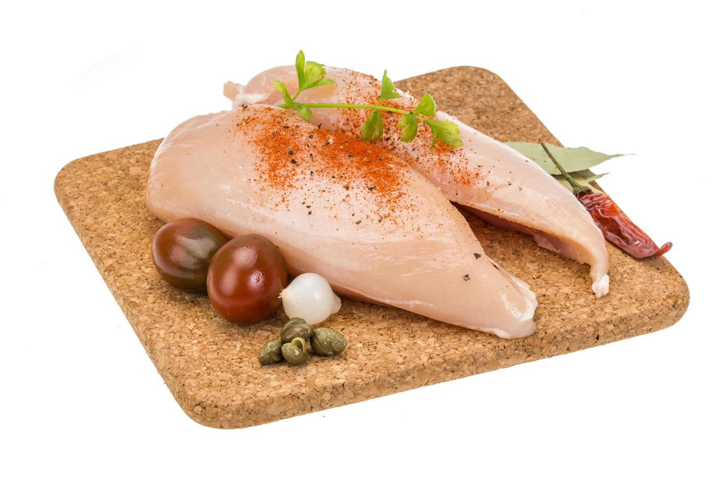 Chicken pile on white photo