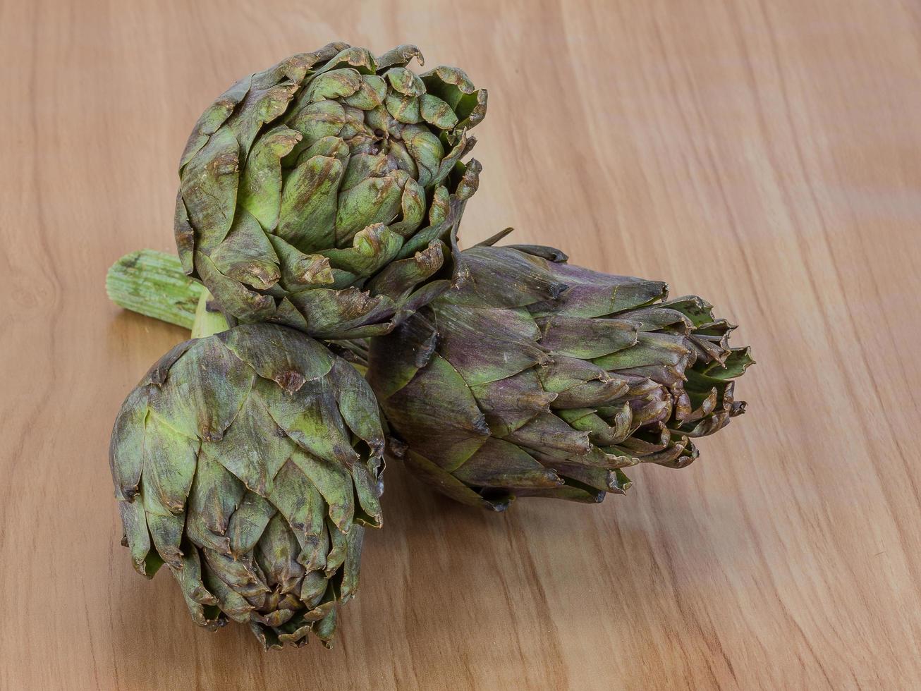 Raw artichokes dish photo