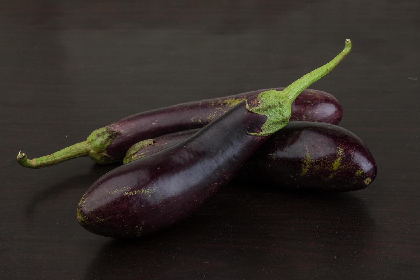 Aubergine on wood photo