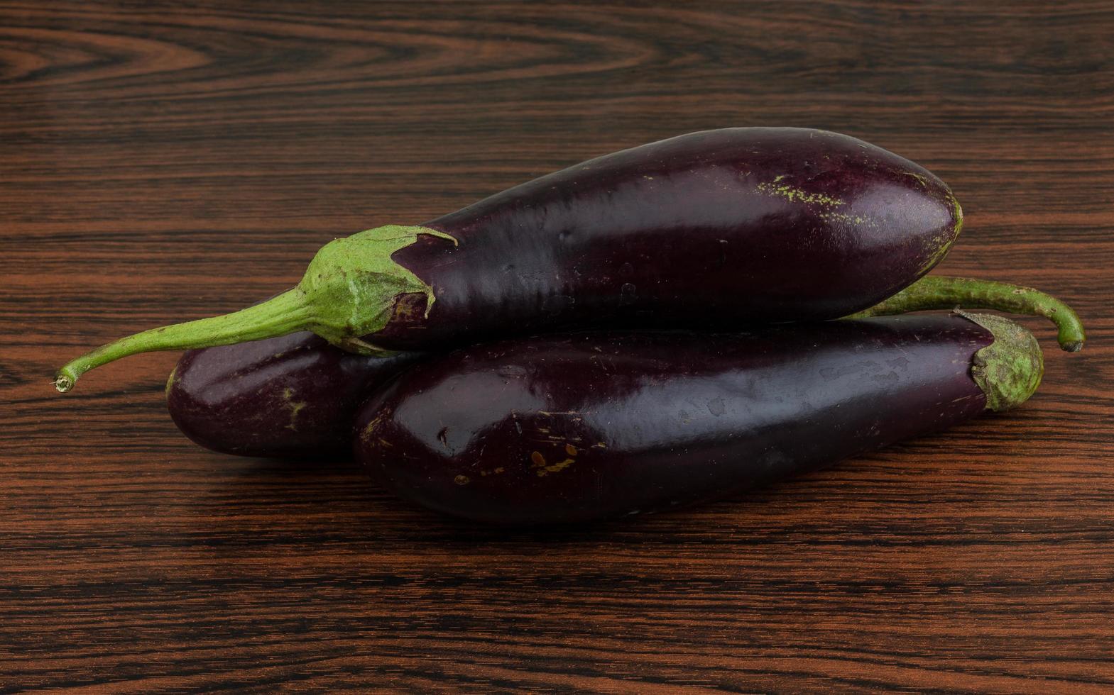 Aubergine on wood photo