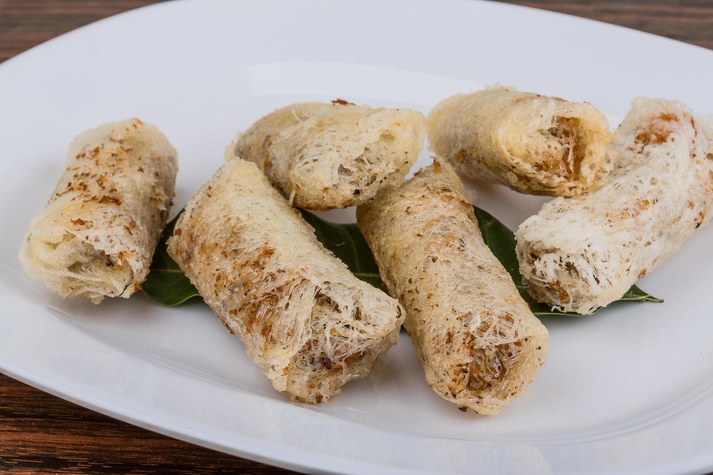 Spring rolls on wood photo