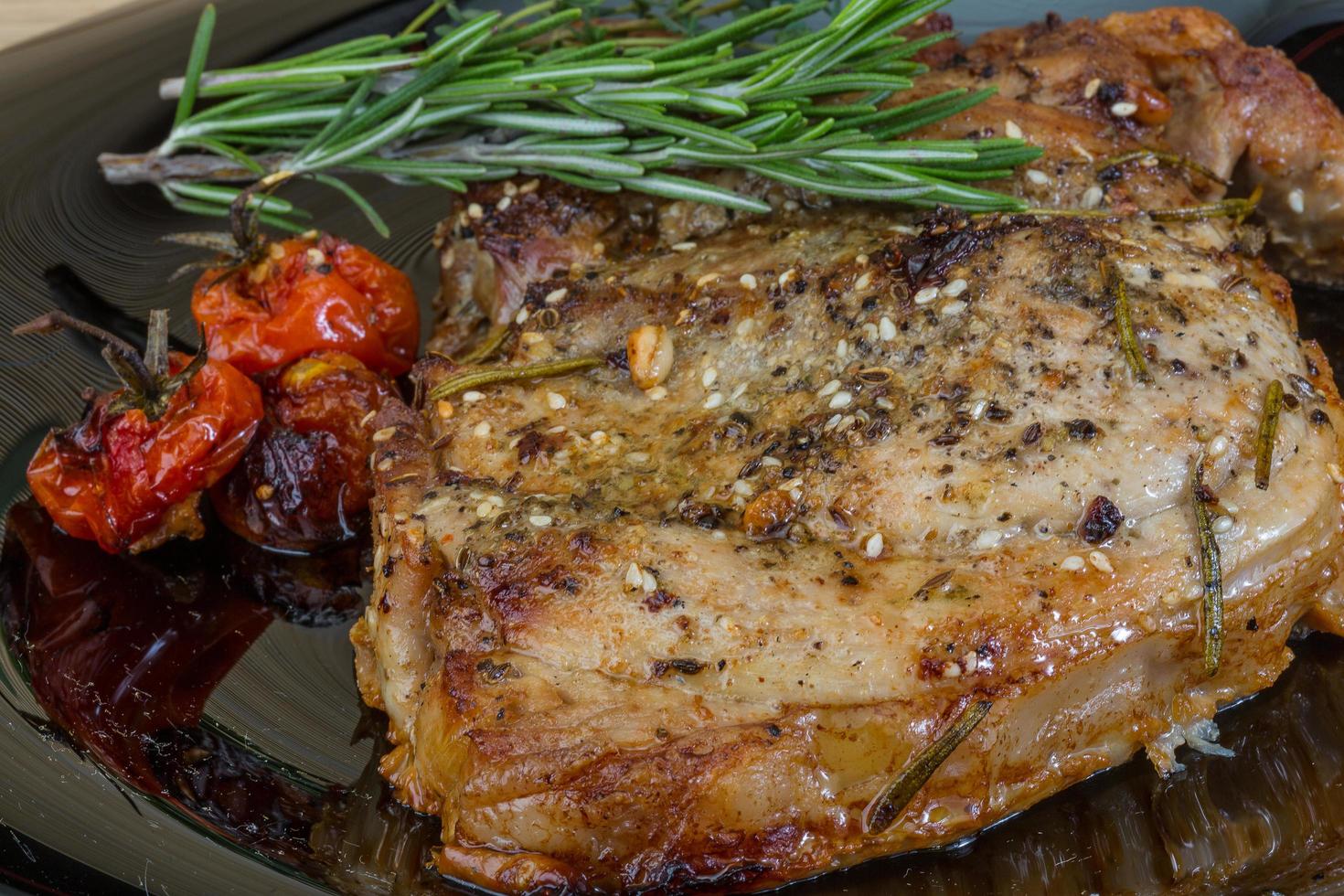 Roasted pork on wood photo