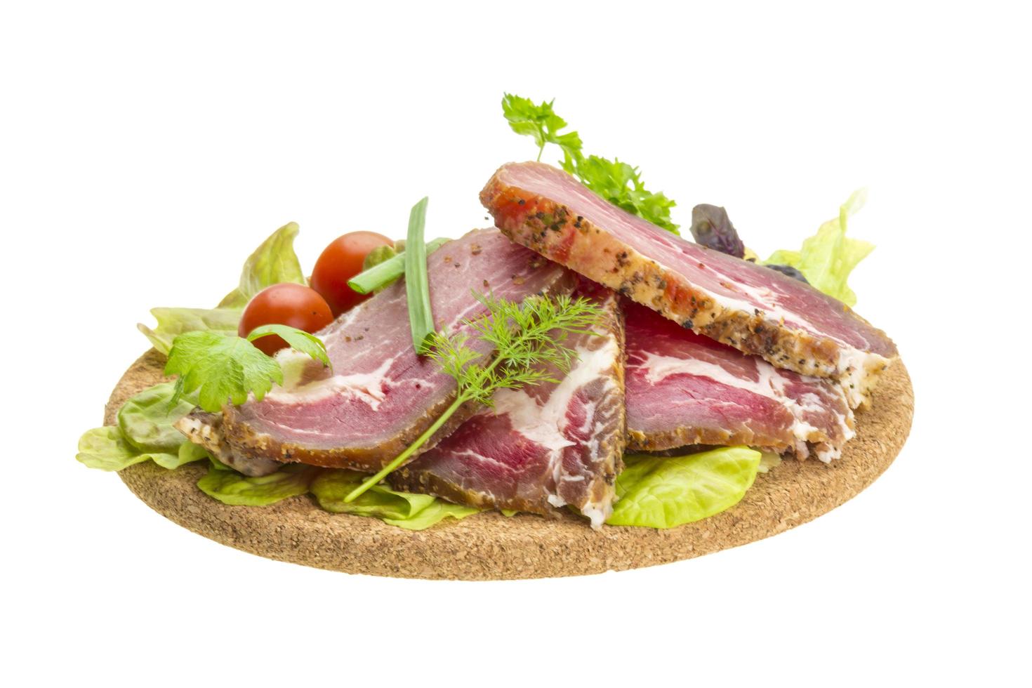 Smoked beef on white photo
