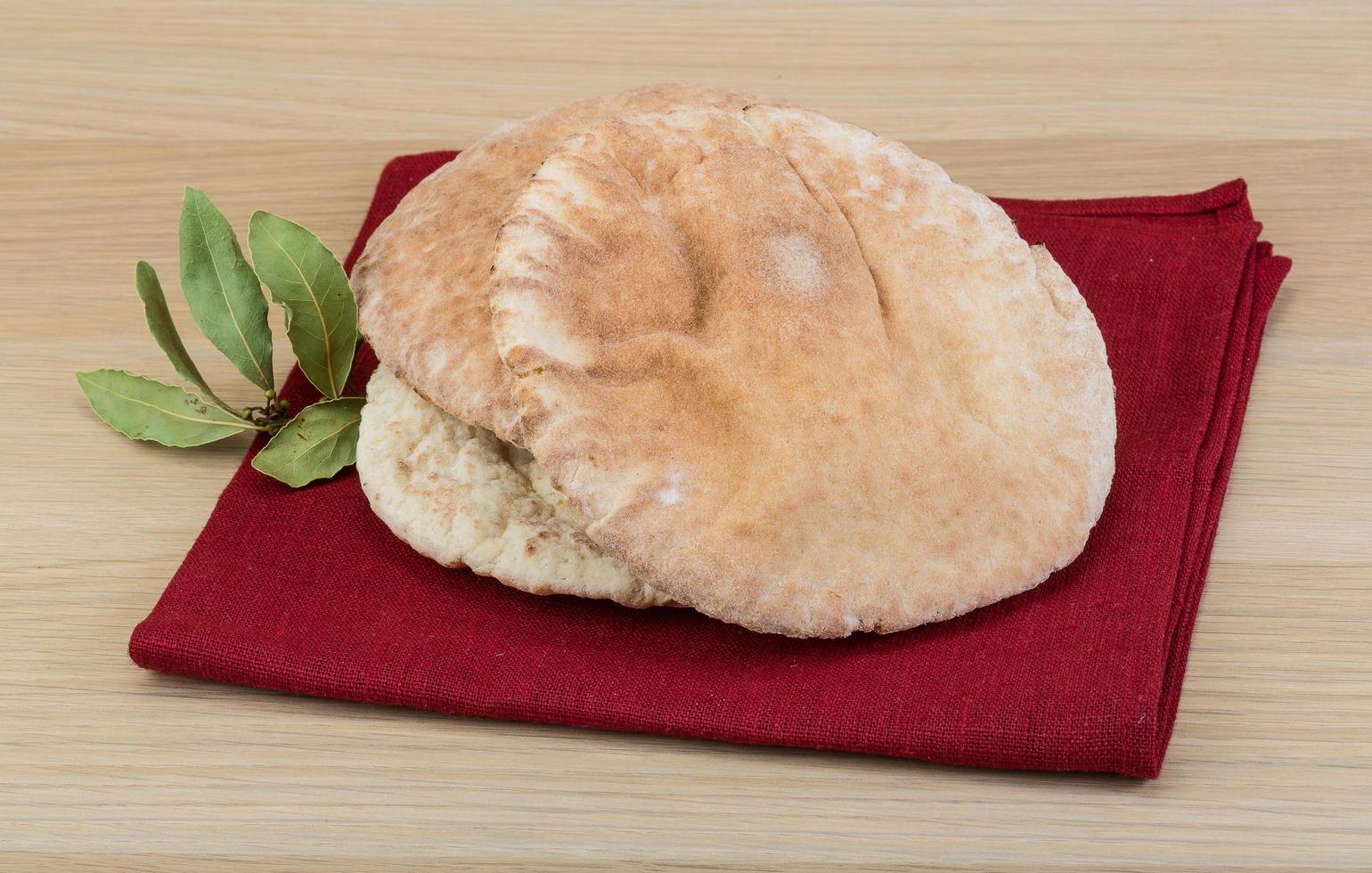 Pita on wood photo