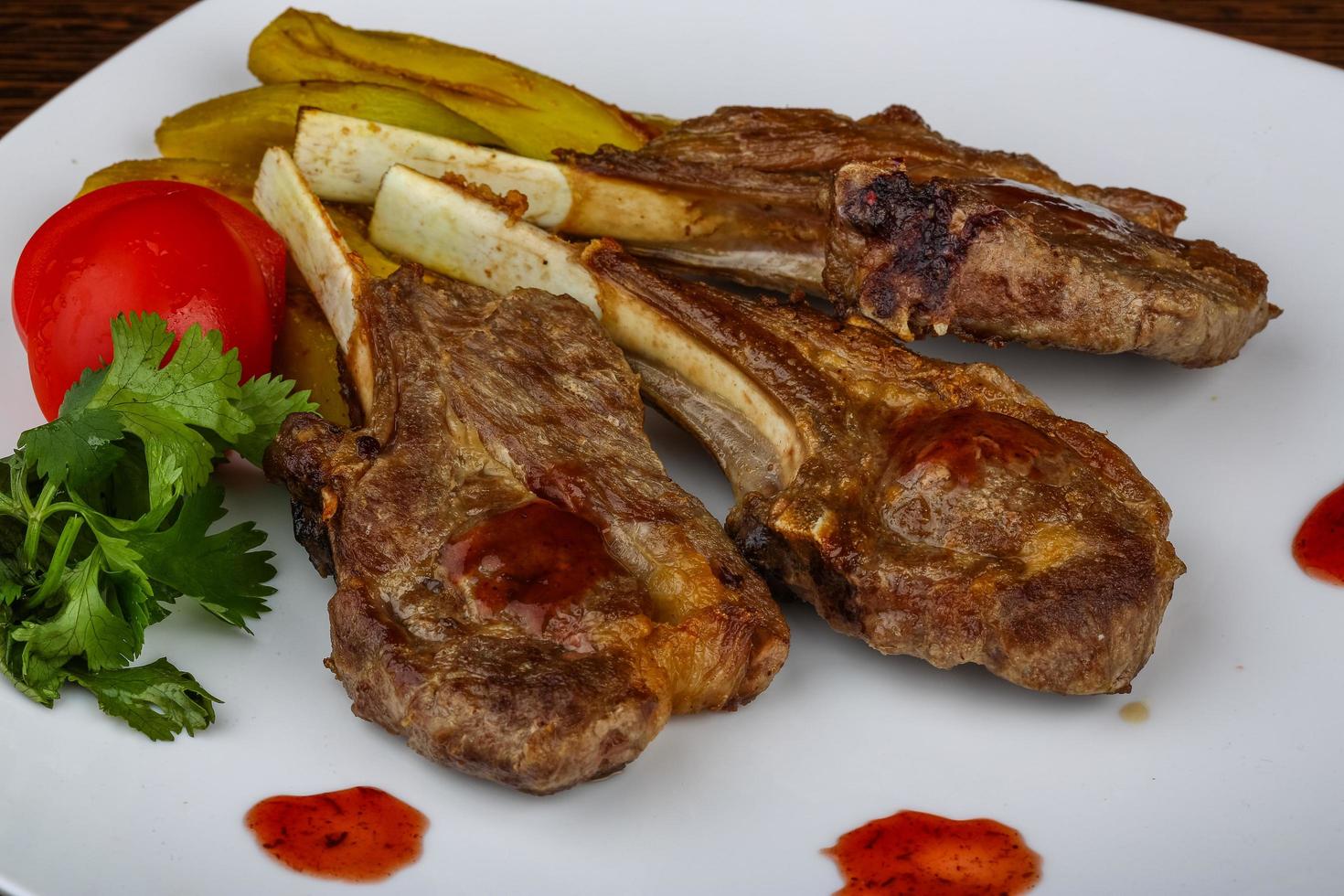 Lamb chops on the plate photo