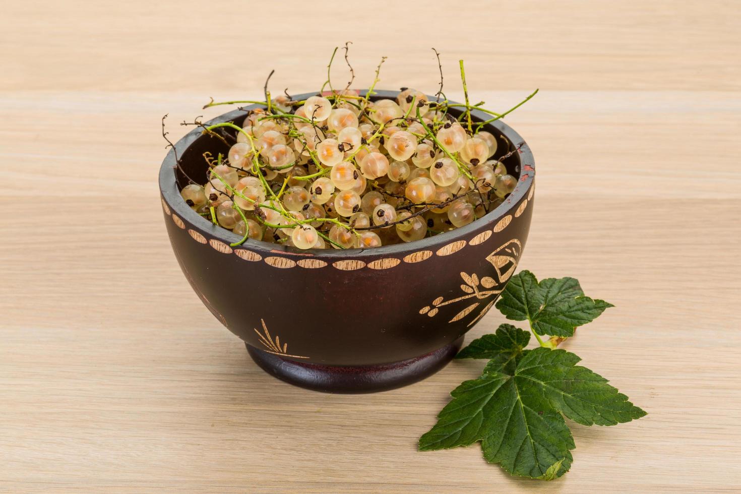 White currant on plate photo