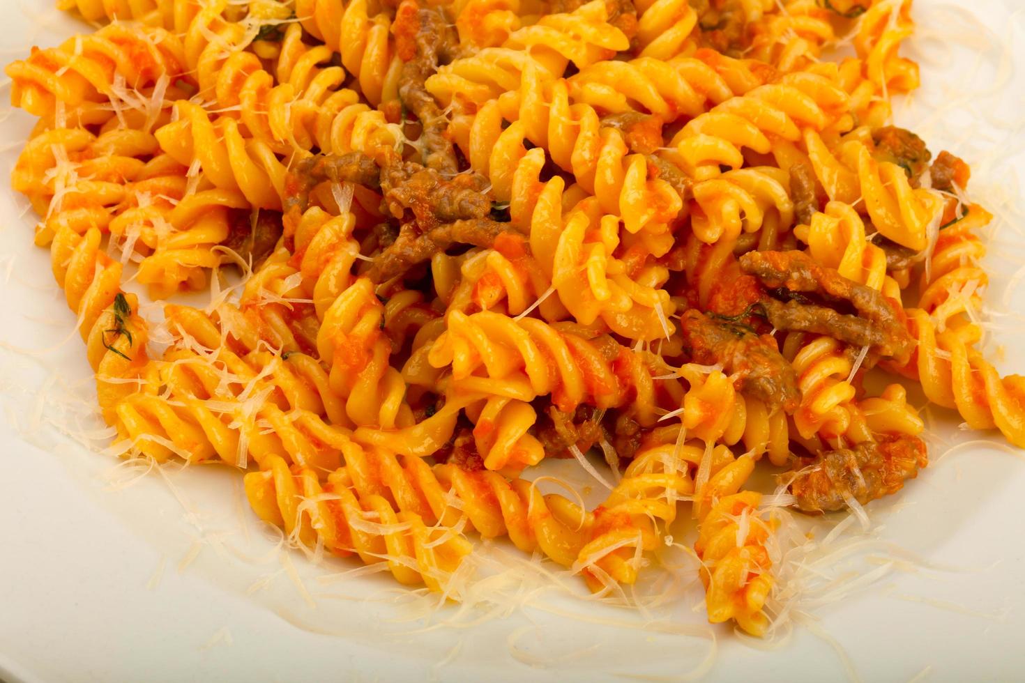 Fussili bolognese dish 12730510 Stock Photo at Vecteezy