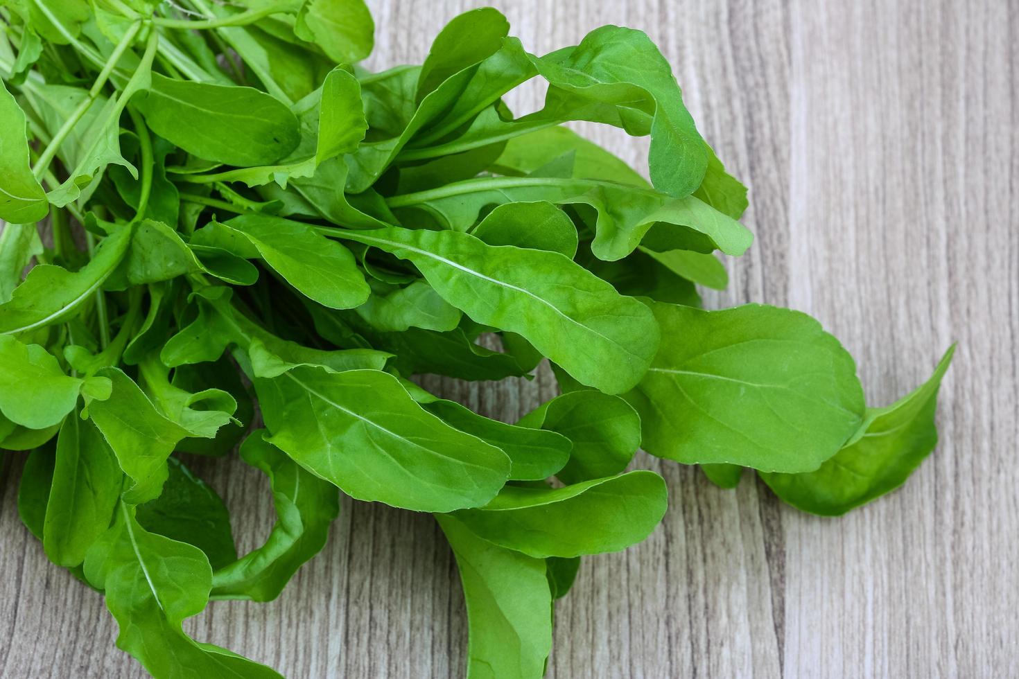 Ruccola on wood photo