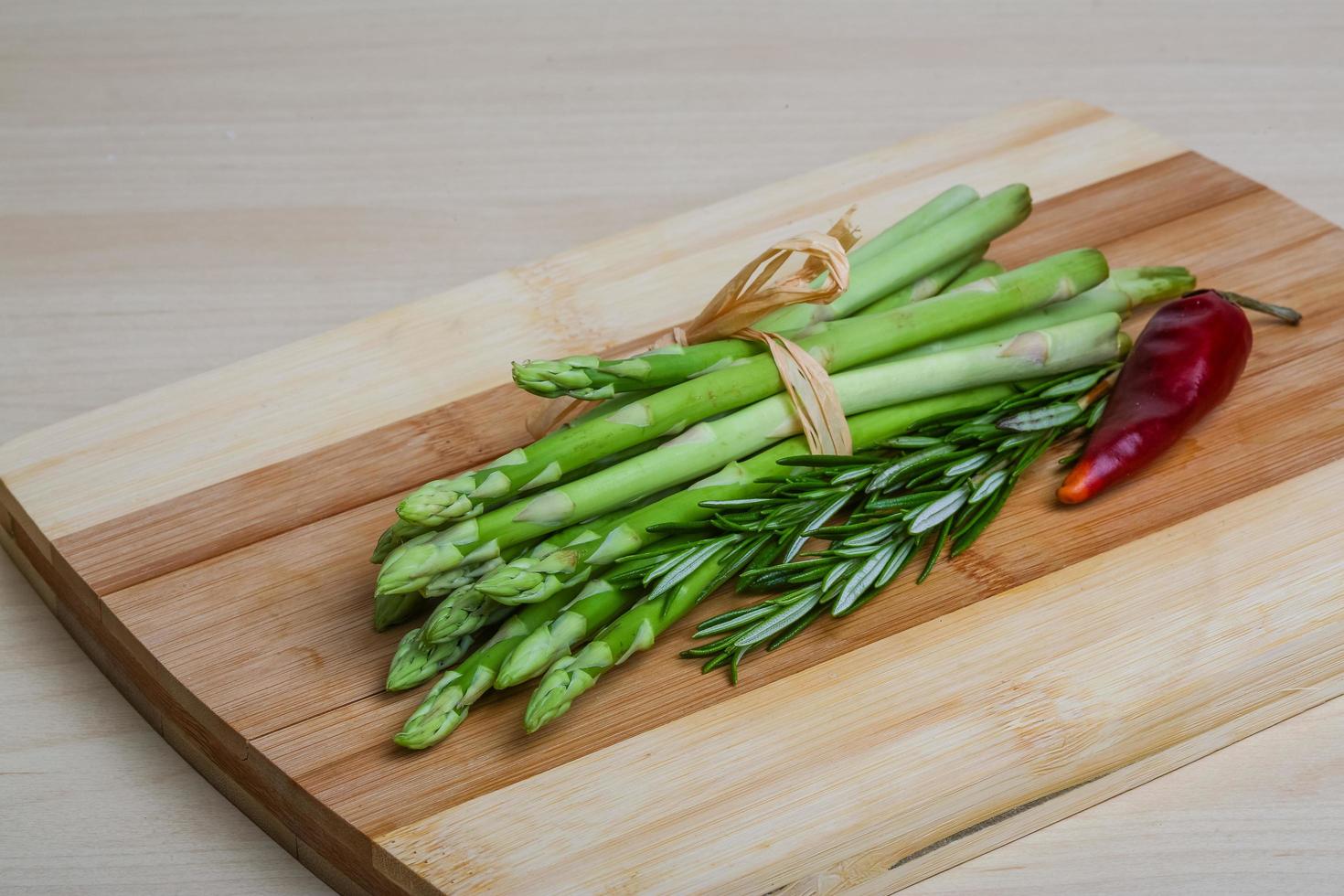 Raw asparagus dish photo