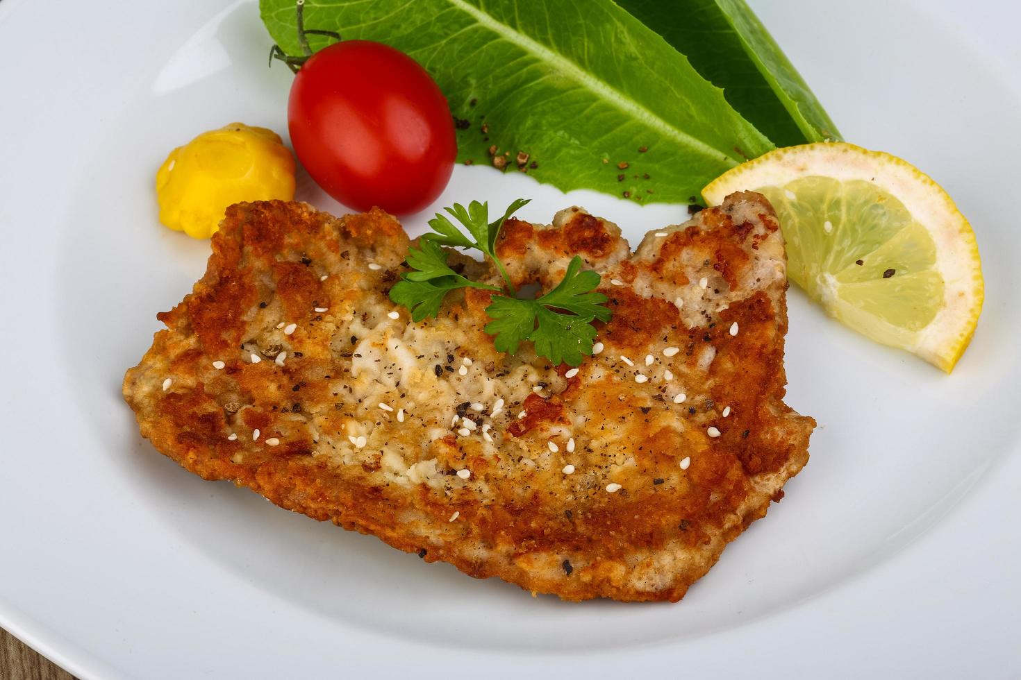 Pork schnitzel close up view photo