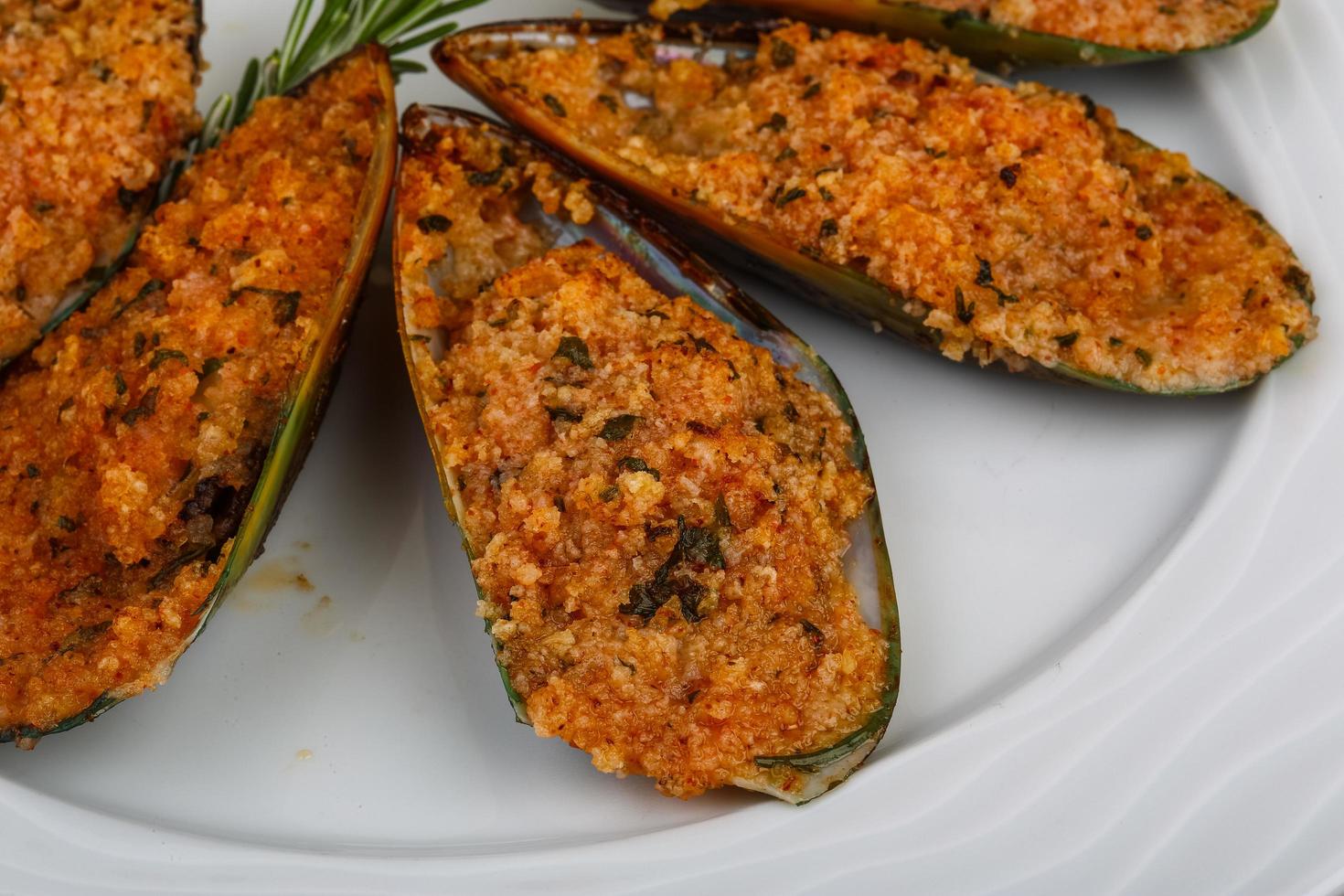 Baked mussels on wood photo