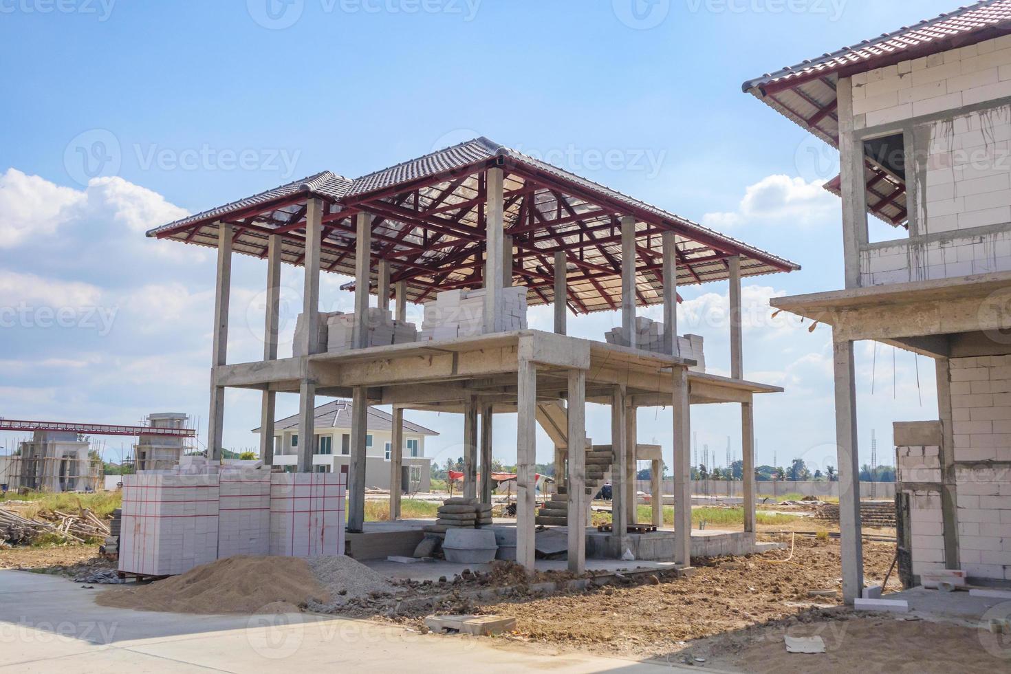 construction residential new house in progress at building site housing estate development photo