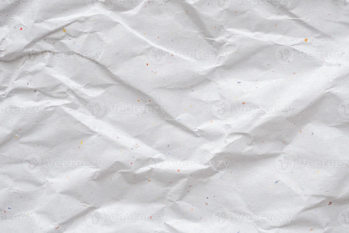 white crumpled and creased recycle paper texture background photo