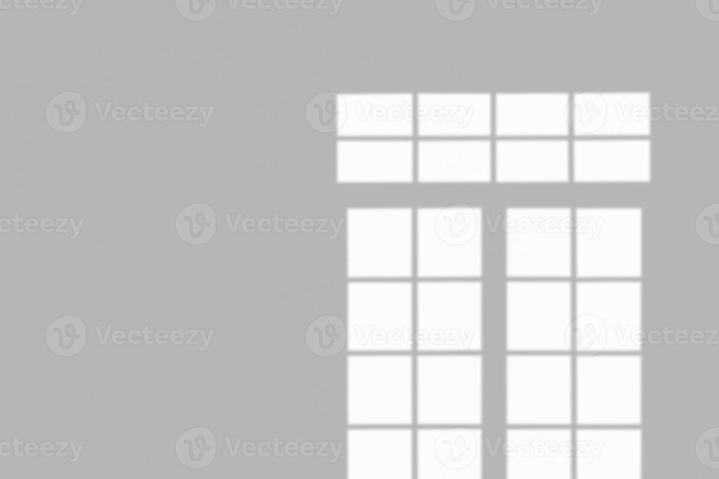 Window shadow drop on white wall background photo