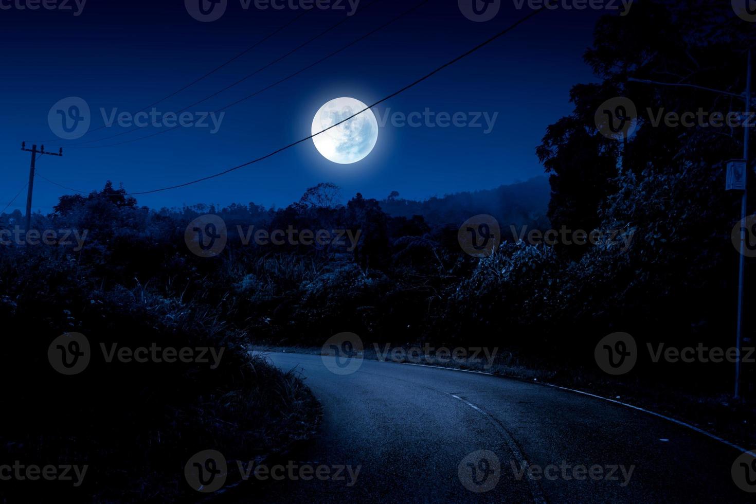 Rural highway landscape at night photo