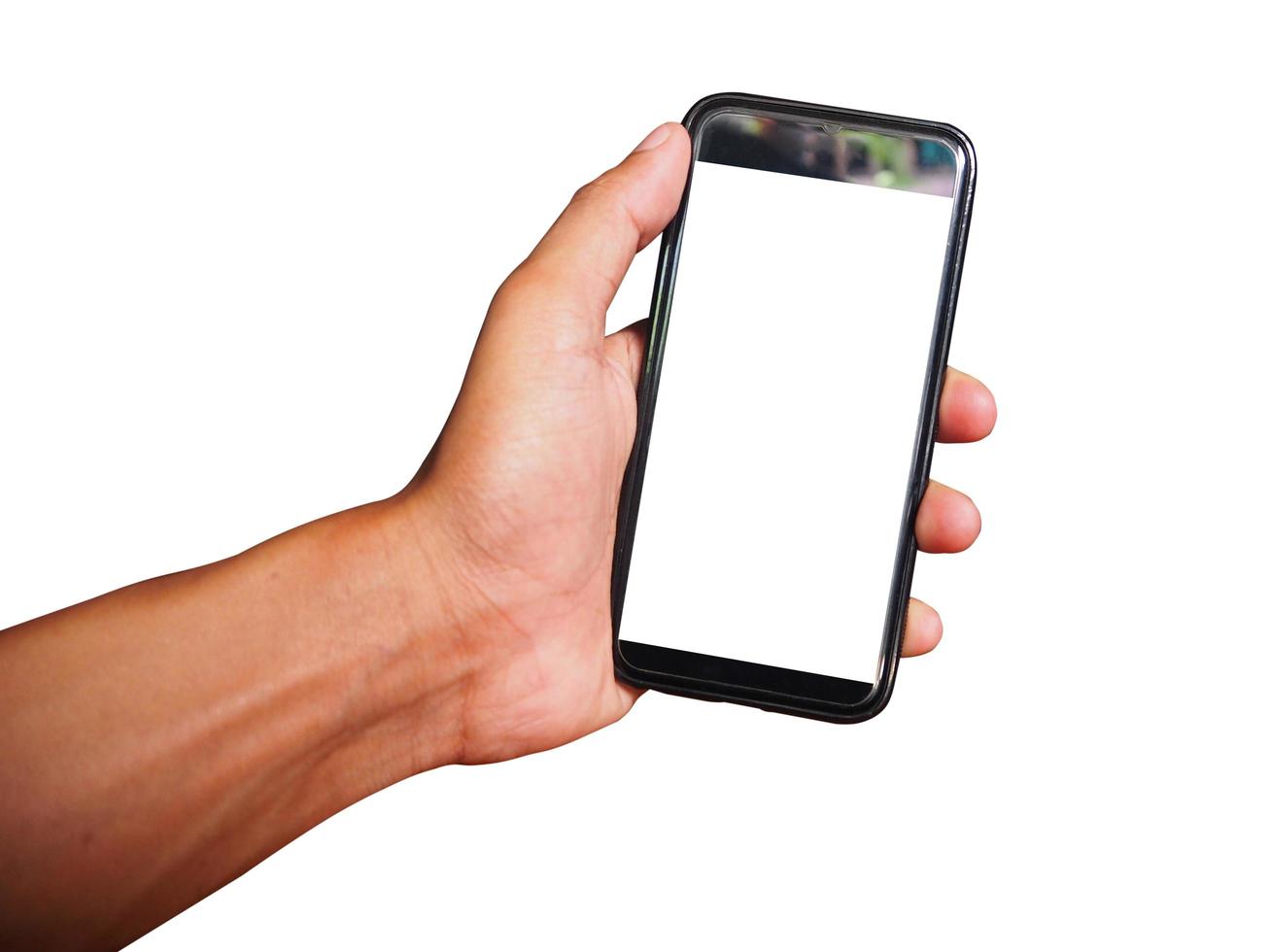 Young man hand holding black smartphone with blank screen isolated on white background. Space for text or design photo