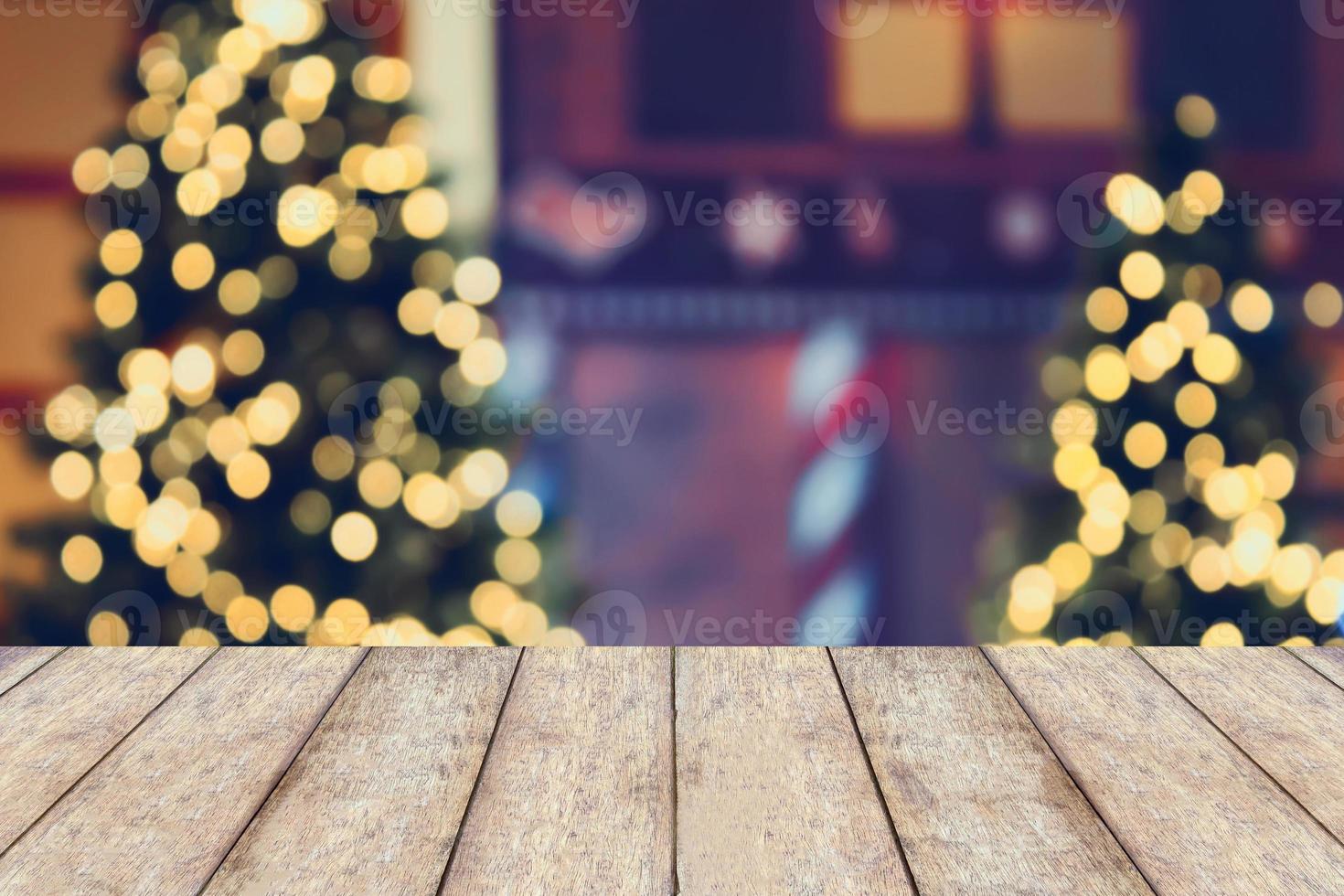 Christmas holiday background with empty wooden table photo