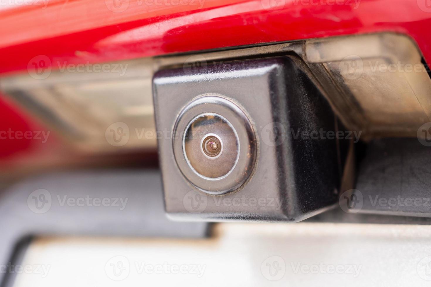 Red car rear view camera close up for parking assistance photo