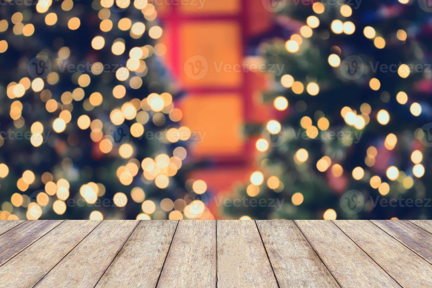 Christmas holiday background with empty wooden table photo