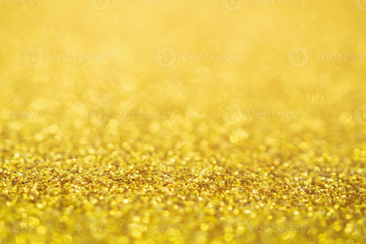 Desenfoque de fondo de textura navideña festiva con brillo dorado abstracto con luz bokeh foto