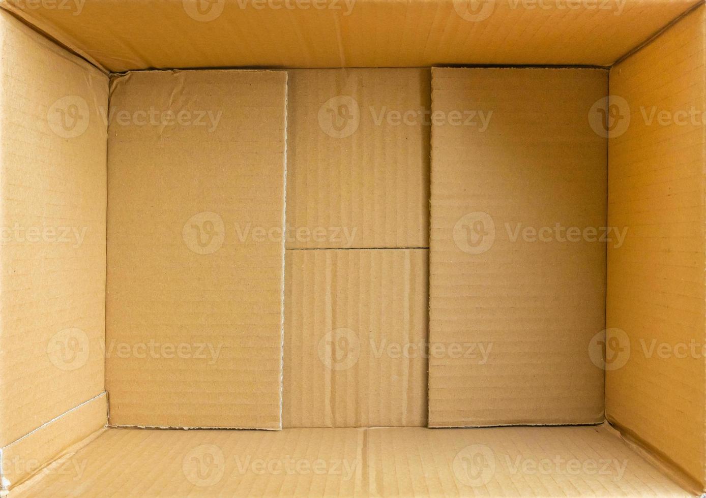 Open empty brown cardboard box background top view photo