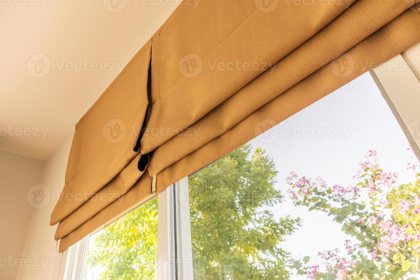 Roman blind curtain decoration in living room interior photo