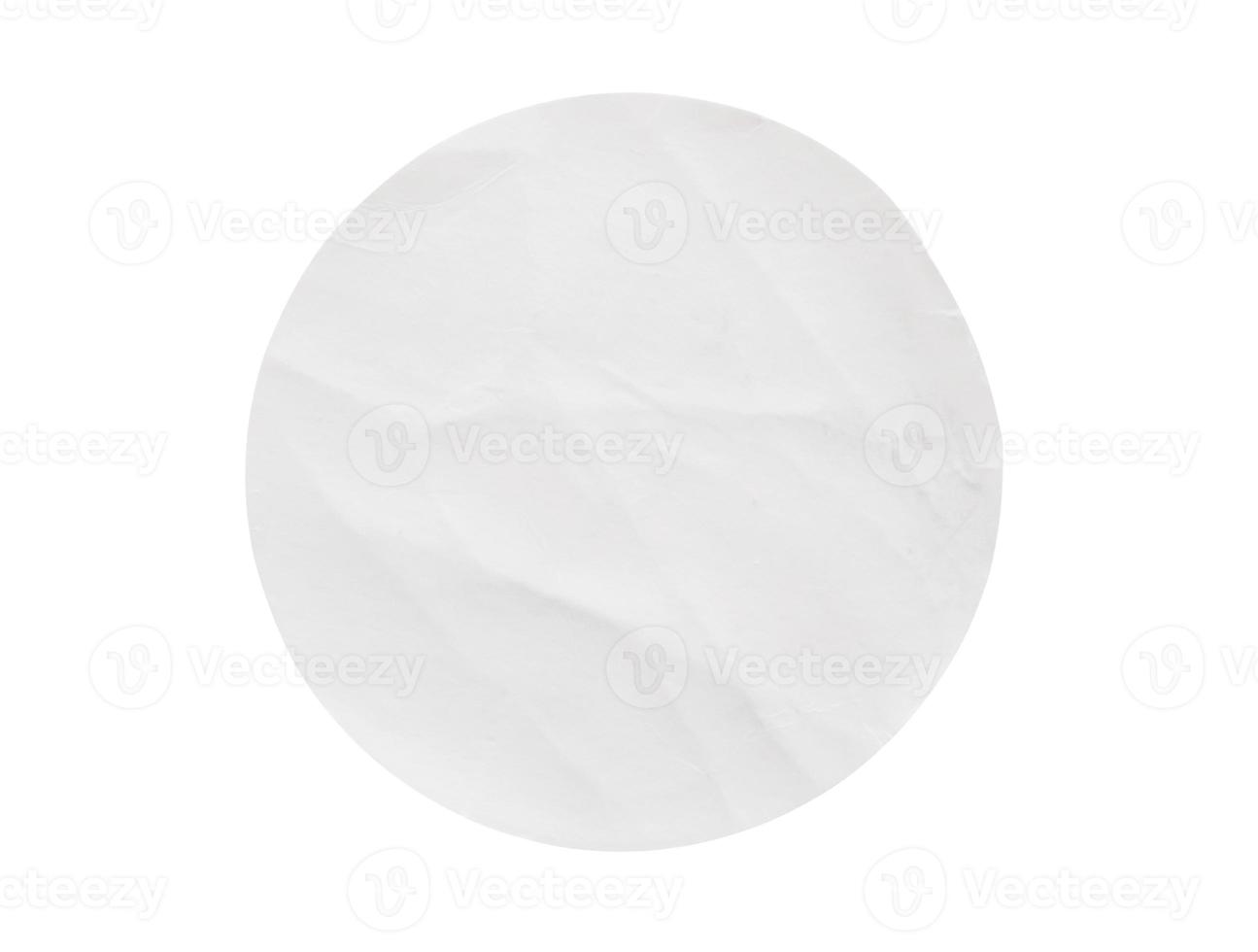 Blank white round paper sticker label isolated on white background photo