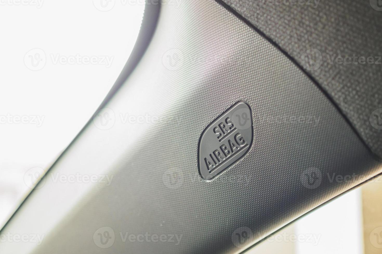 Safety side curtain airbag sign in new modern car photo