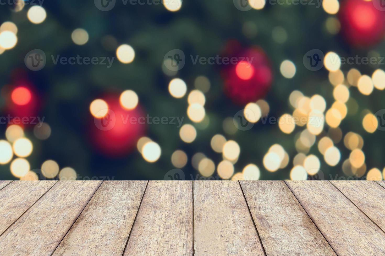 Christmas holiday background with empty wooden table photo