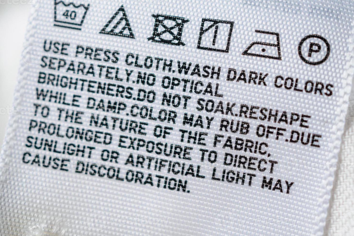 Cloth label tag with laundry care instructions photo