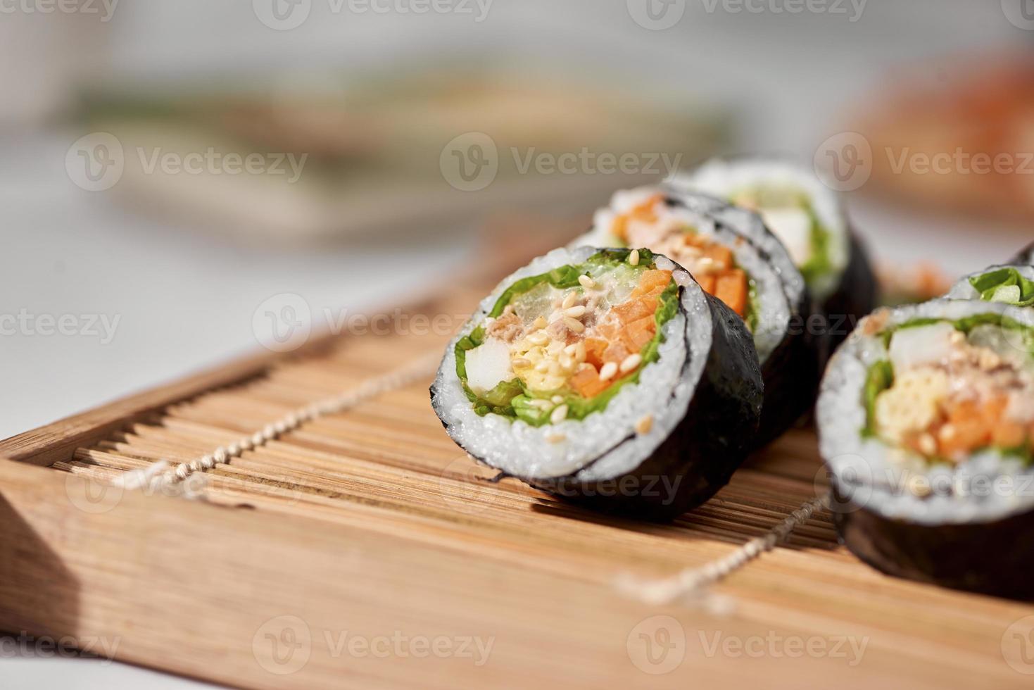 Korean roll Gimbap kimbob made from steamed white rice bap and various other ingredients photo