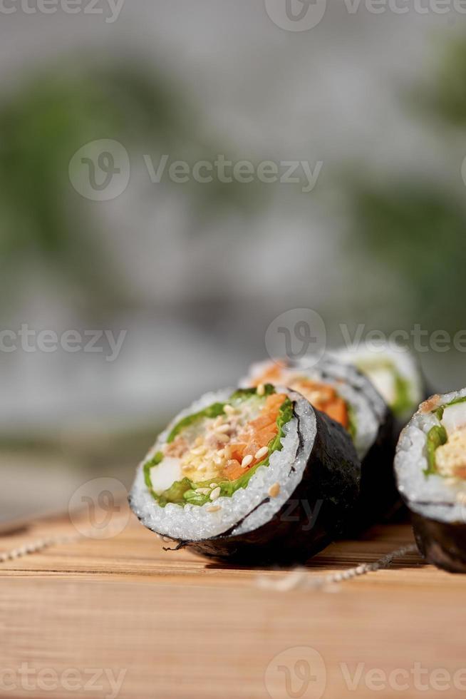 Korean roll Gimbap kimbob made from steamed white rice bap and various other ingredients photo