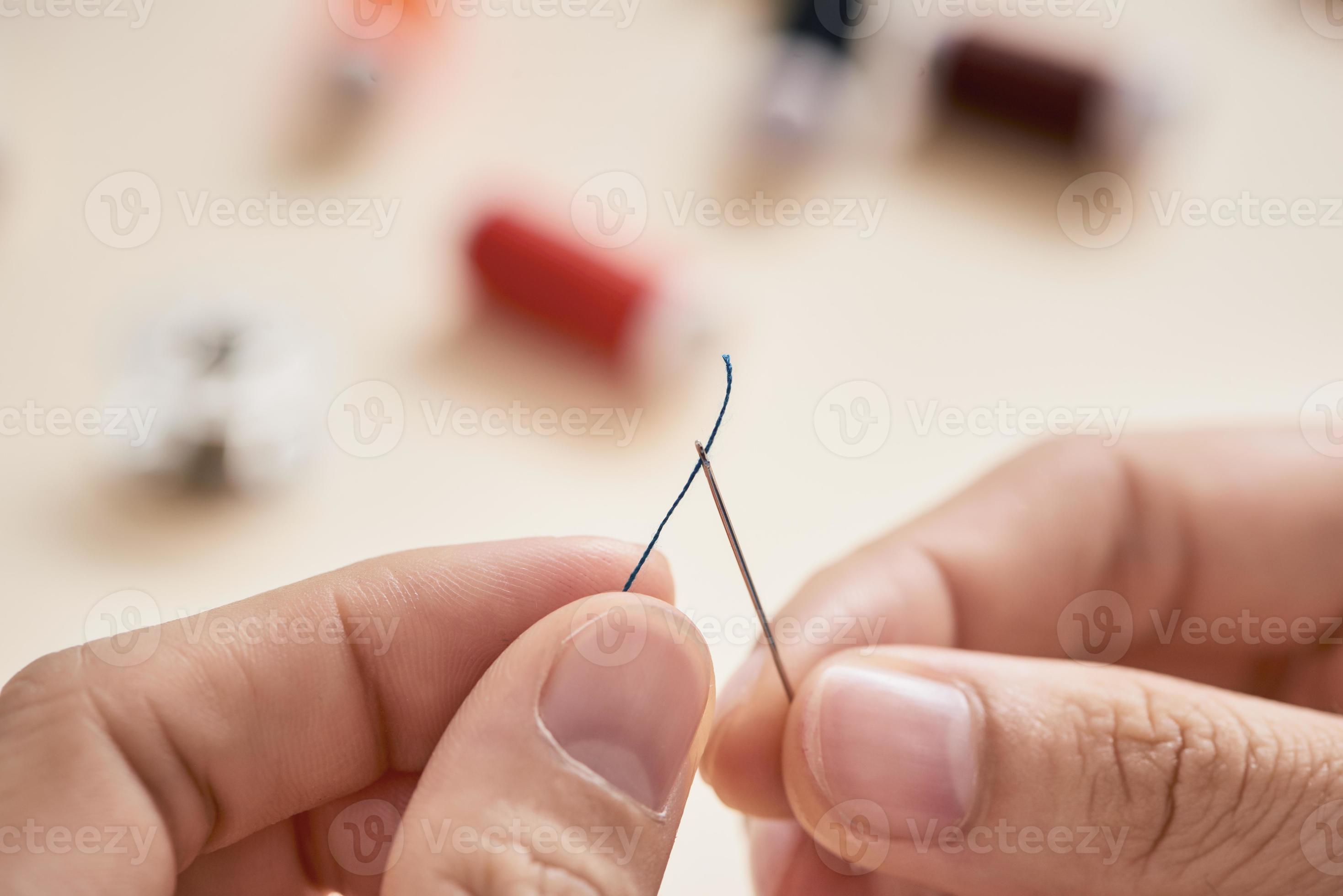 people, needlework, sewing and tailoring concept tailor woman with