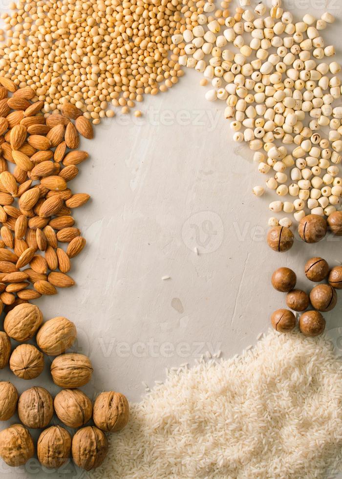 Mix of nuts Macadamia, almond, soy, rice, lotus. Top view. photo