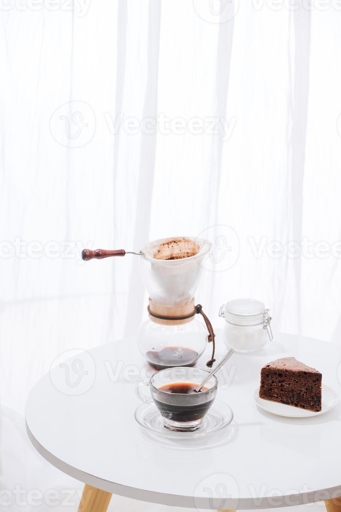 Drip coffee dripper and drip ground coffee with glass drip pot, cup and