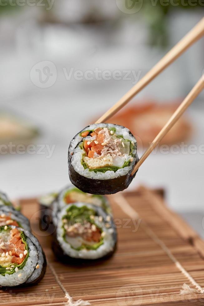 Korean roll Gimbap kimbob made from steamed white rice bap and various other ingredients photo