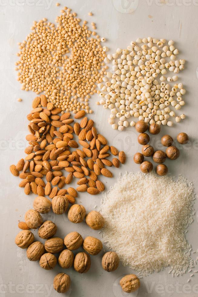 Mix of nuts Macadamia, almond, soy, rice, lotus. Top view. photo