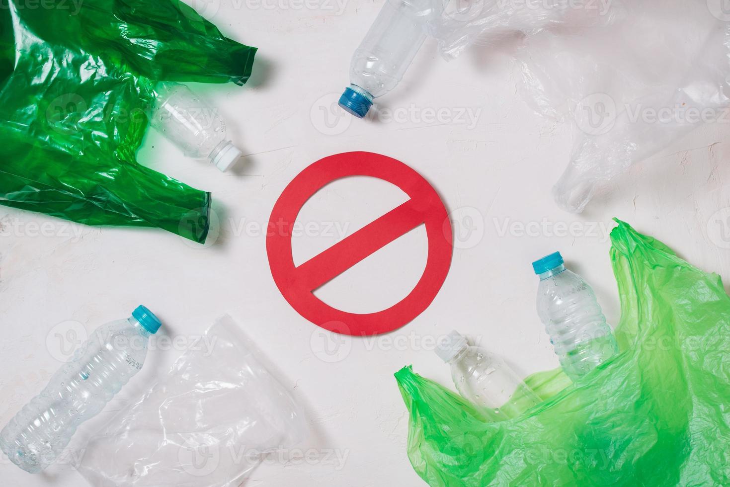 No plastic recycle concept, plastic bottles stack to recycle on white background photo