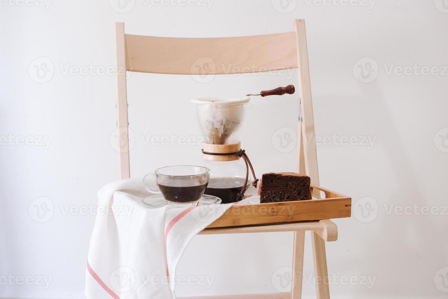 Serving hot coffee in the living room of his home in the morning photo