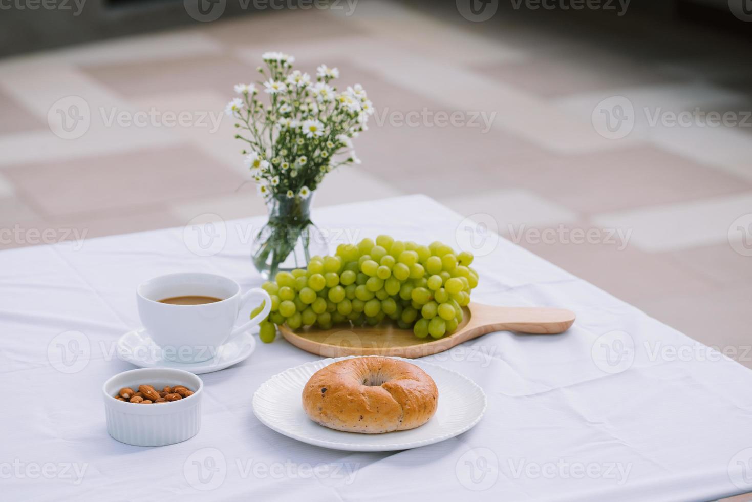 breakfast with coffee bread and fruit photo