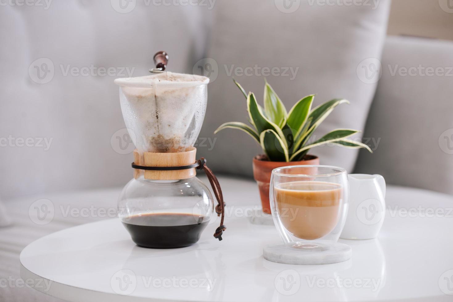 Breakfast with chocolate cake and coffee served on a beautiful living home photo