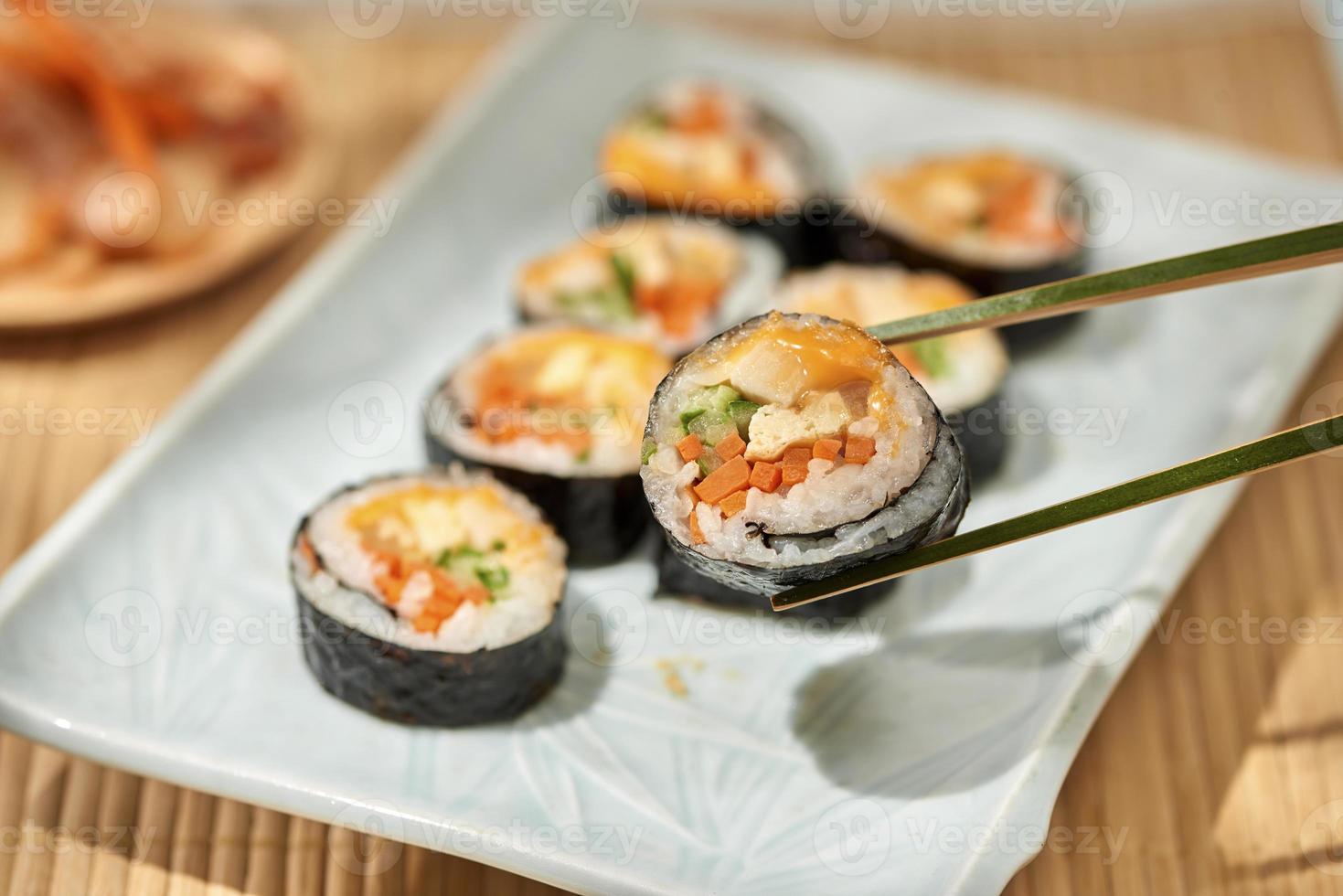 Korean roll Gimbap kimbob made from steamed white rice bap and various other ingredients photo