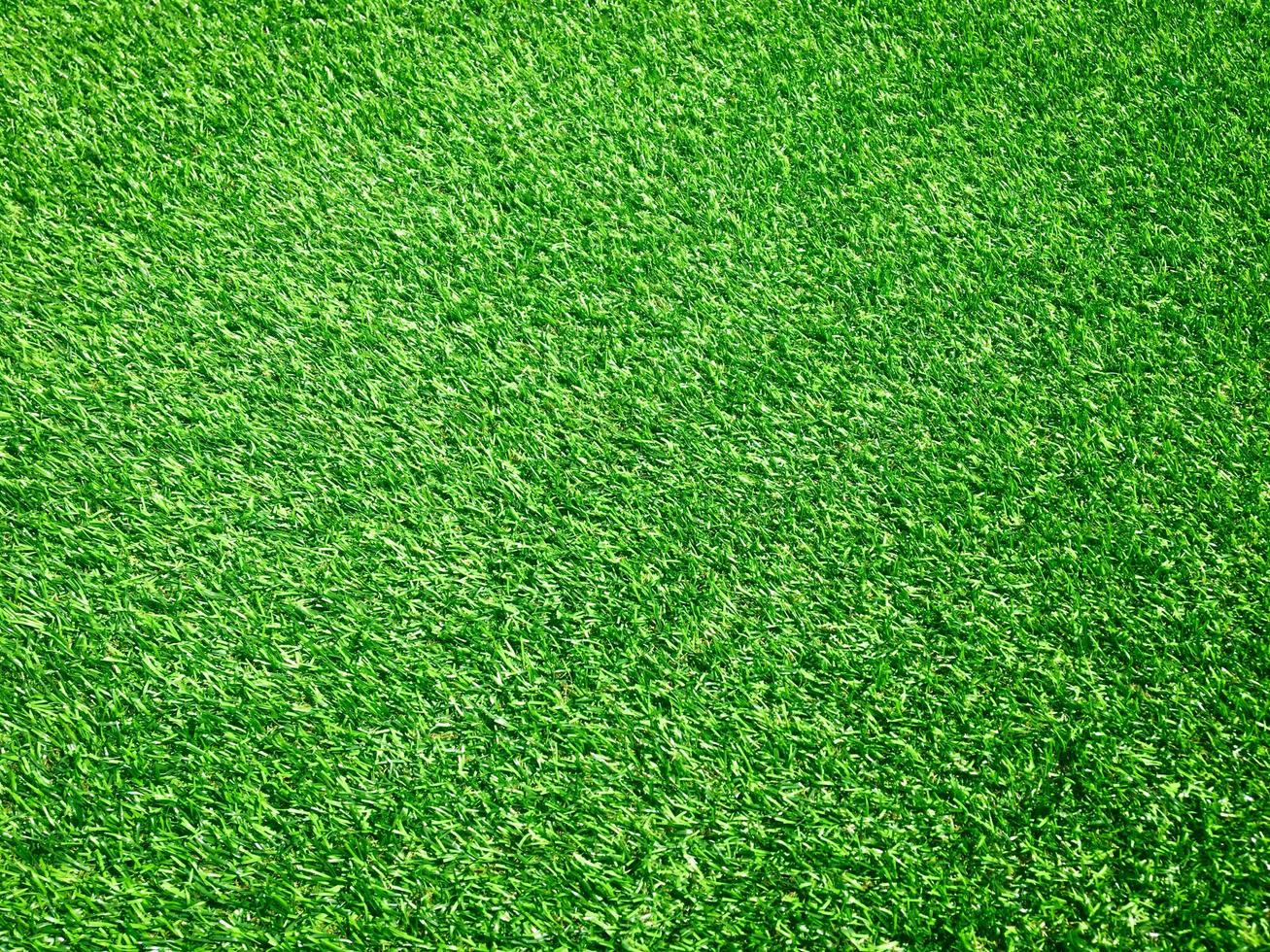 Artificial grass texture space background photo