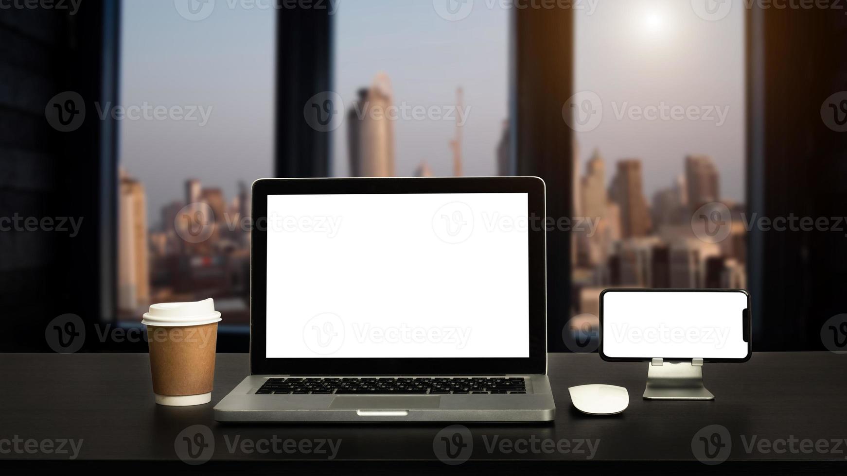 Front view workspace with computer, smartphone and tablet on white desk photo