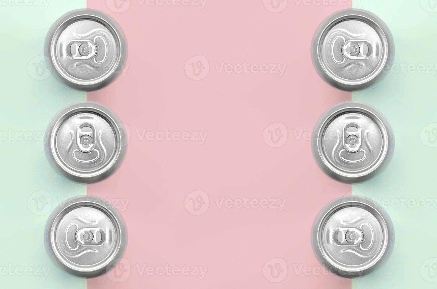 Many metallic beer cans on texture background of fashion pastel turquoise and pink colors photo