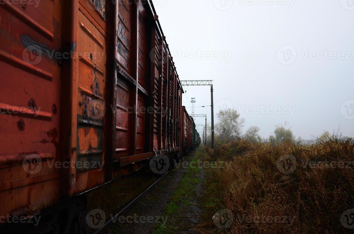 Photo of the train on rainy cloudy weather with shallow depth of field