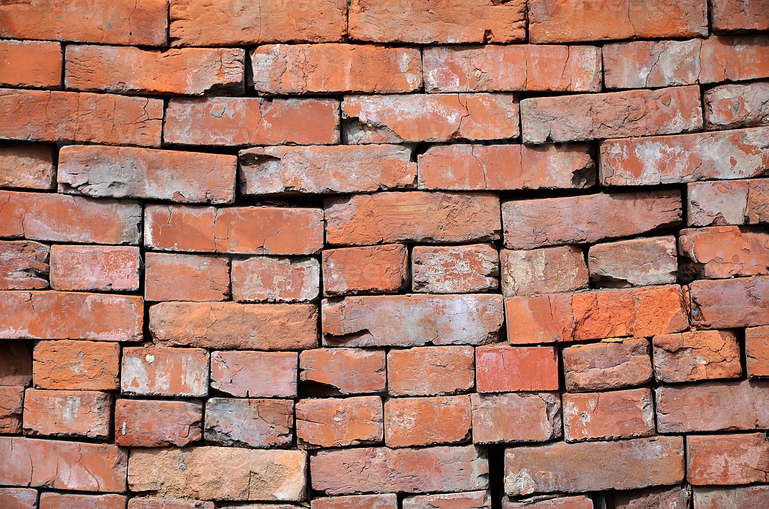 A photo of a set of old bricks that are stacked in a multilayered pile
