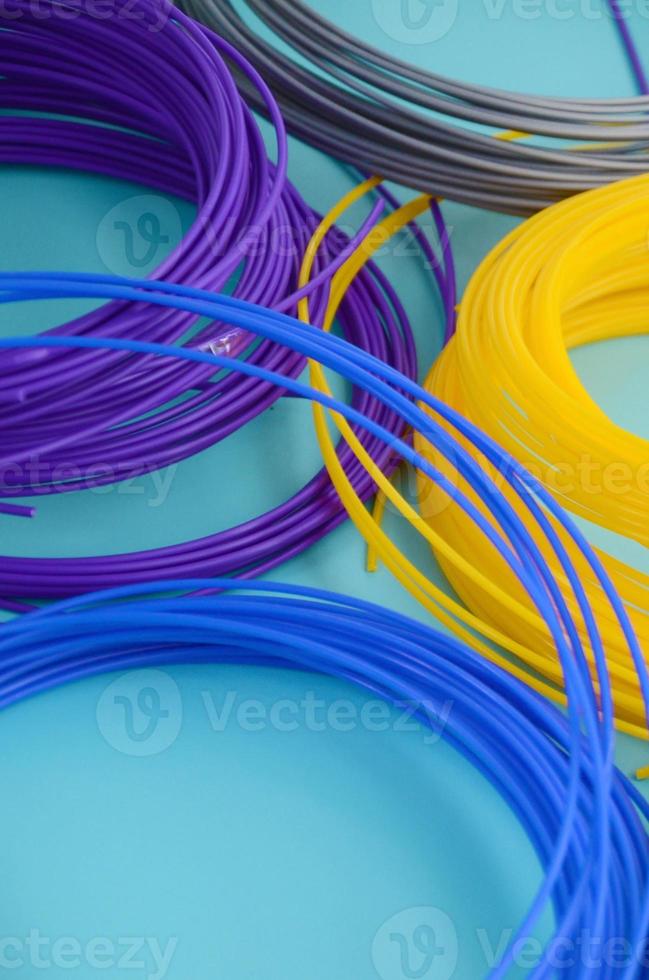 Plastic PLA and ABS filament material for printing on a 3D pen or printer of various colors photo