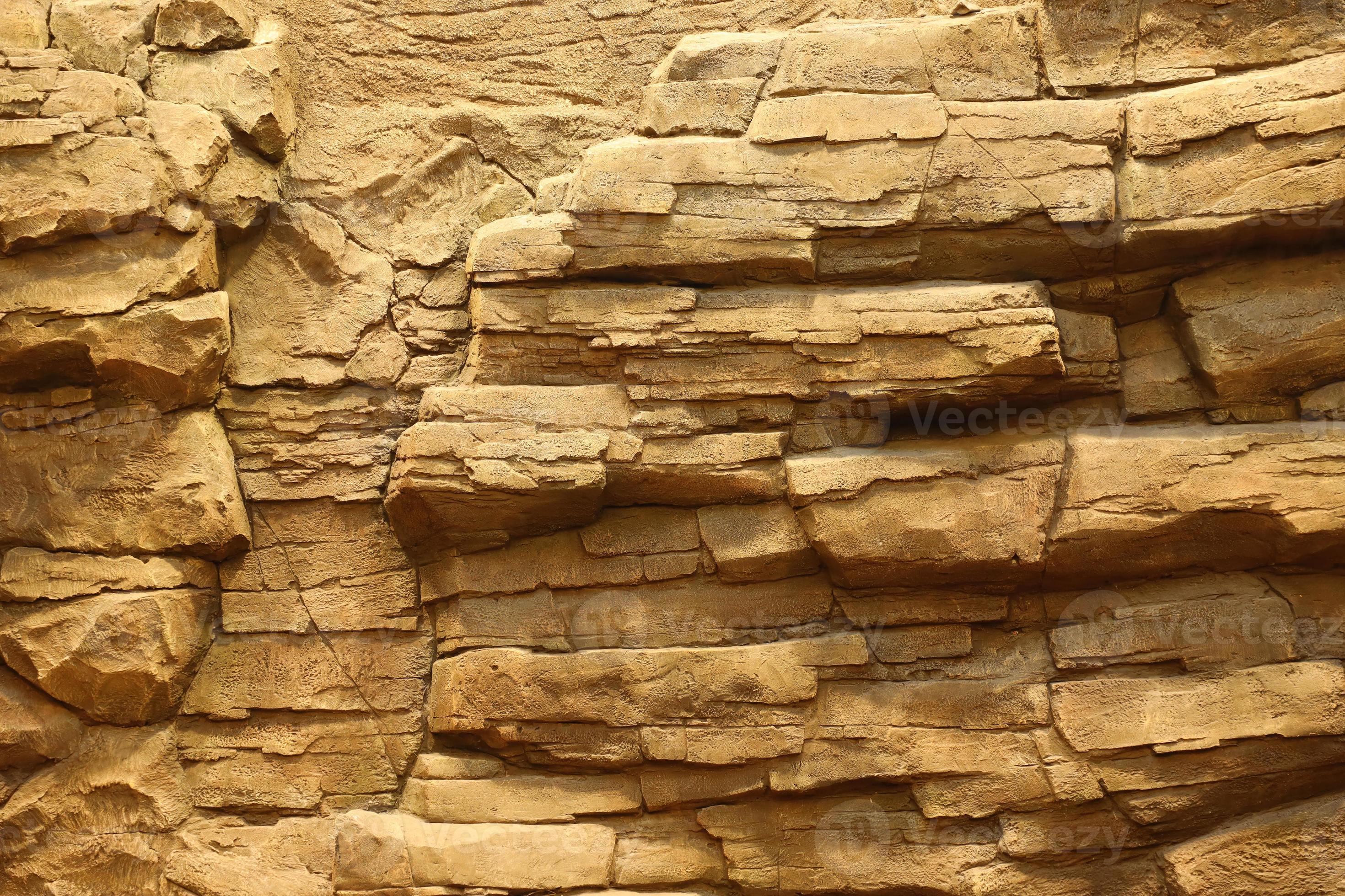 Light coarse natural rock stone background. Mining cliff rough front  surface. Big limestone stack backdrop. Heavy grunge damaged granite block  texture 12752557 Stock Photo at Vecteezy