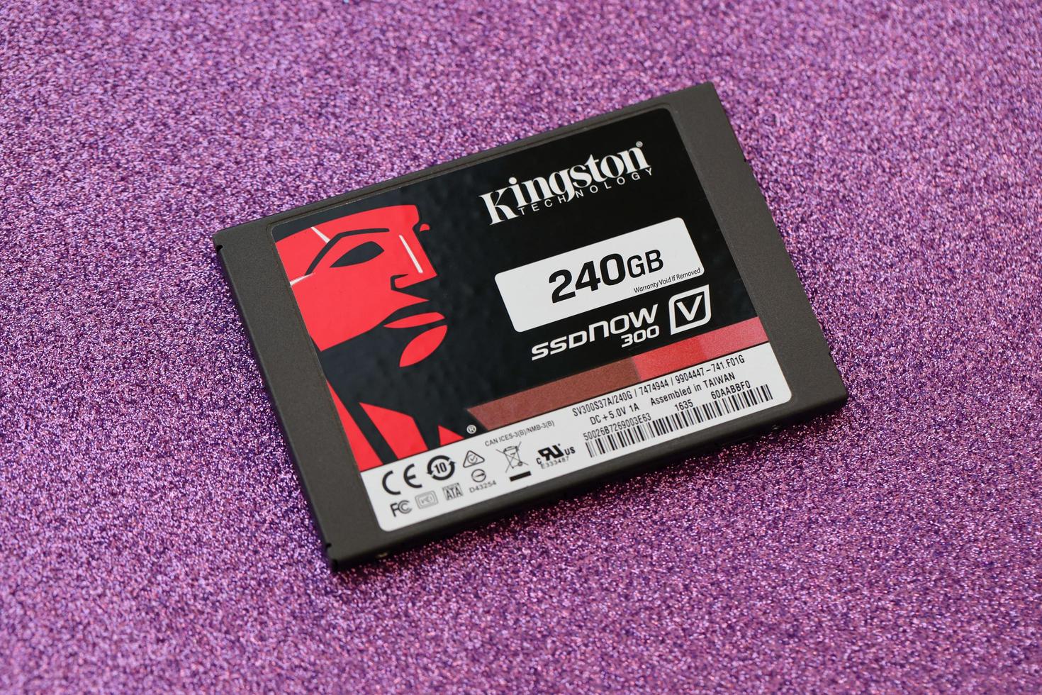 TERNOPIL, UKRAINE - JUNE 20, 2022 Kingston ssdNOW 300 SSD solid state drive storage 240gb assembled in Taiwan under the Kingston Technology Corporation photo